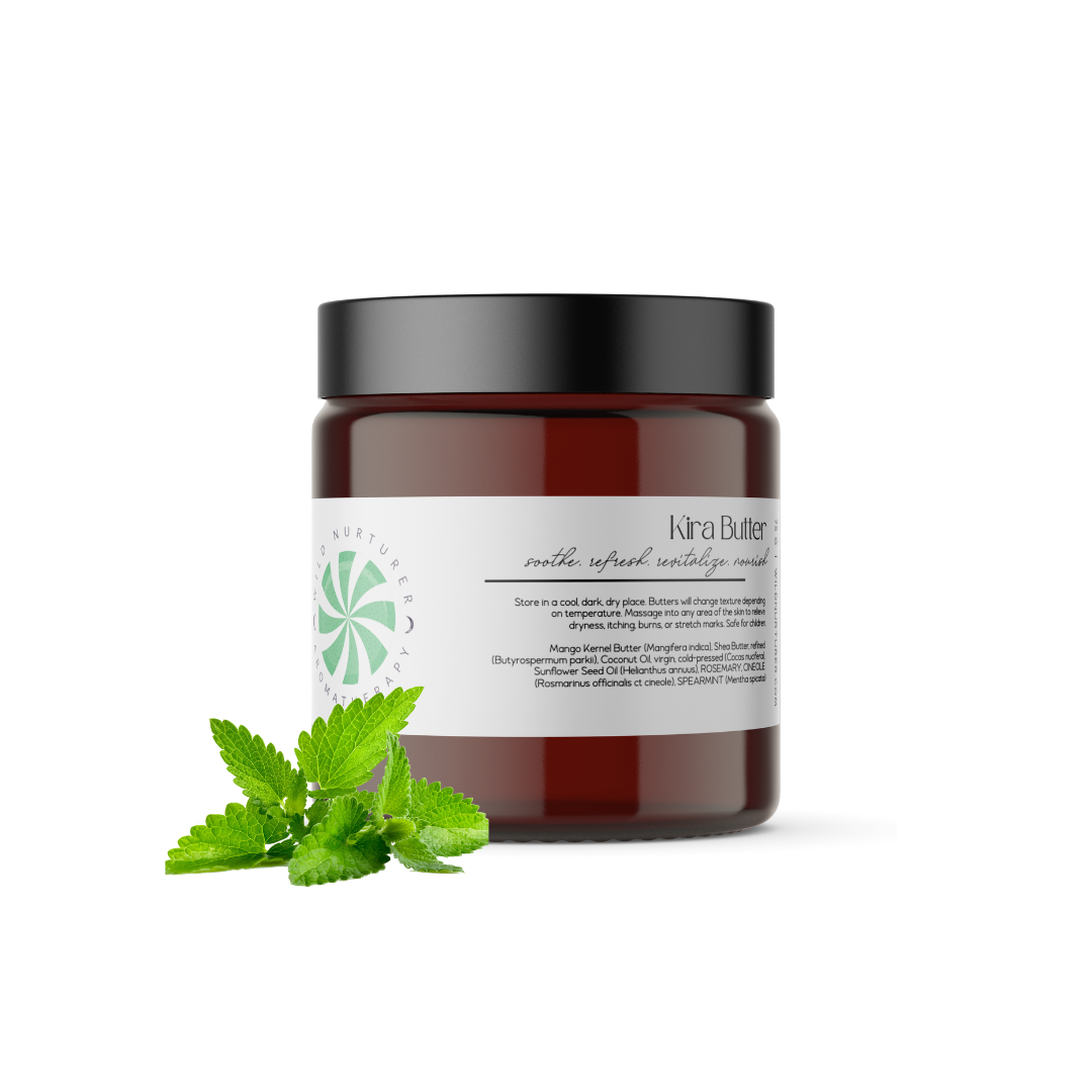 A glass jar of Wild Nurturer Aromatherapy Kira's Collection Rosemary & Mint Body Butter with a white label against a white background. The label includes product details and a green leaf design.