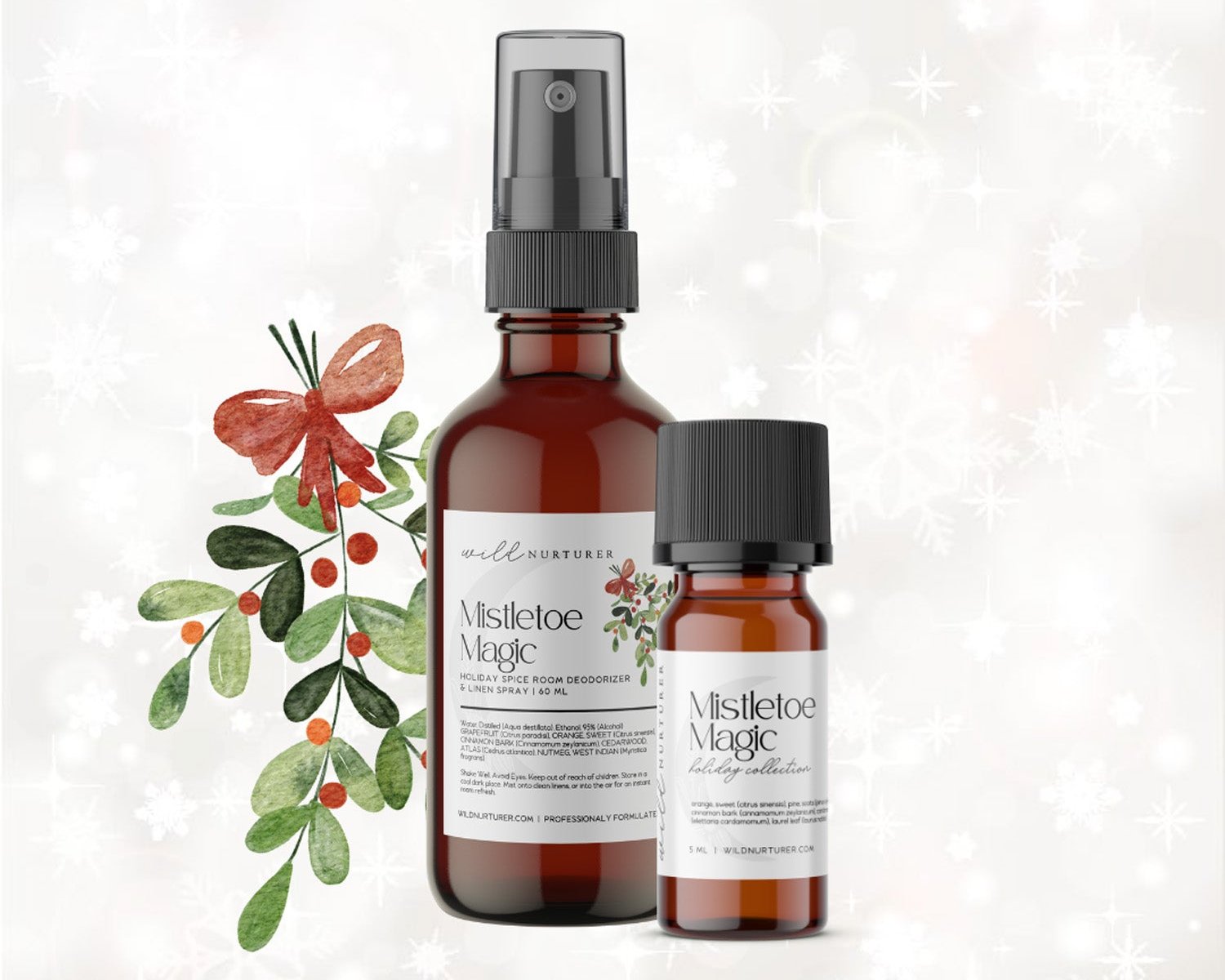 Two bottles of Wild Nurturer Aromatherapy's "Mistletoe & Magic Yuletide Aromatic Blend" with mistletoe and holly decoration on a snowy background.