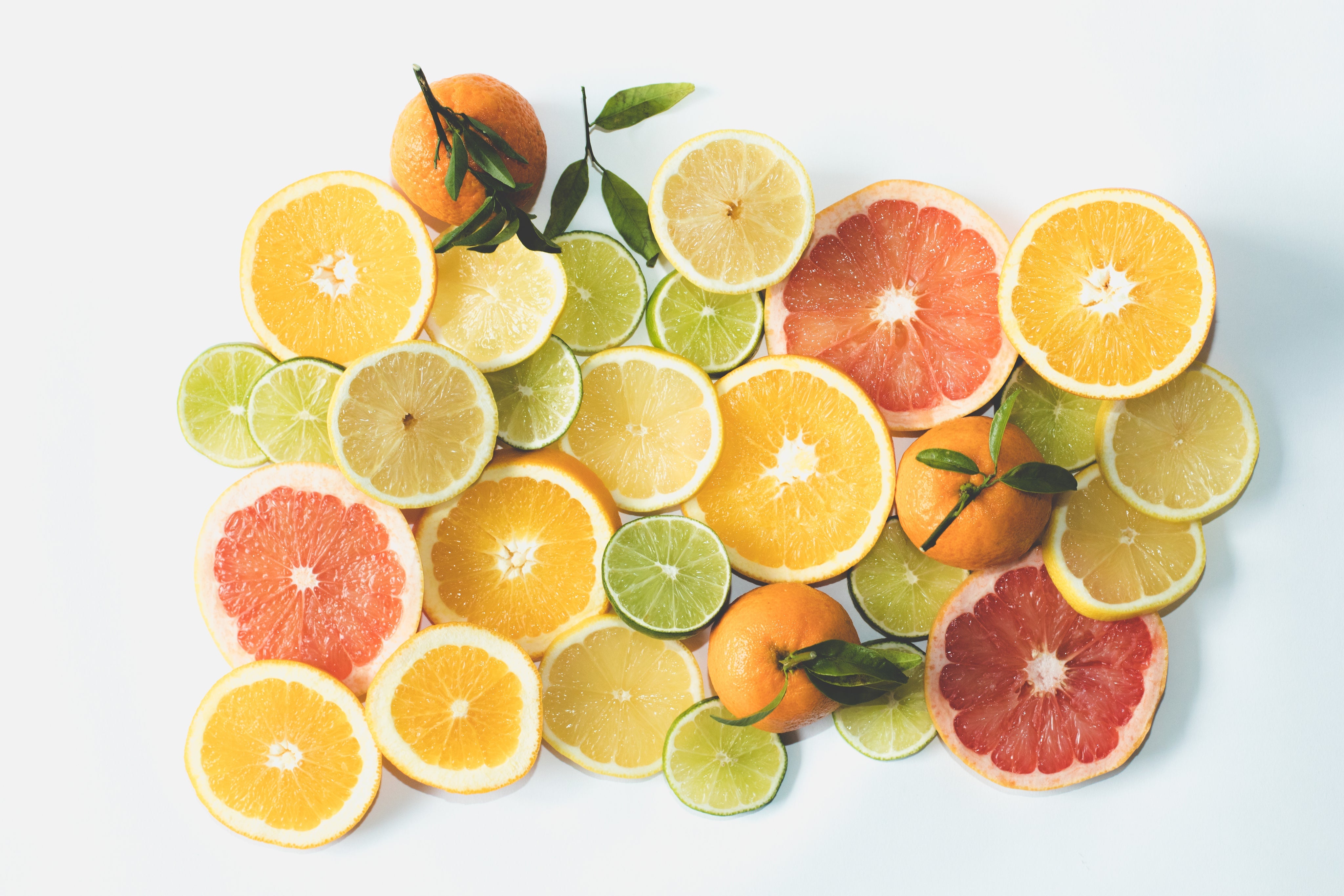 Text on a beige background reads: "Aromatherapy Citrus Collection. Lemon | Orange | Grapefruit | Bergamot. Uplifting | energizing." Simple, minimalist design.