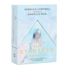 The Starseed Oracle Cards, a 53-card oracle deck and guidebook by Rebecca Campbell with artwork by Danielle Noel, reflecting your cosmic origins, is pictured in its packaging under the brand name Something Different Wholesale.