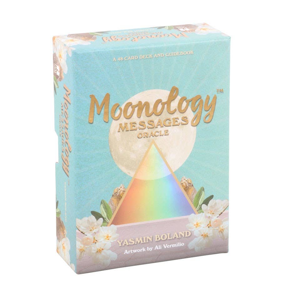 A boxed set of "Moonology Messages Oracle Cards" by Something Different Wholesale, featuring illustrations by Ali Vermilio. The light blue packaging showcases a holographic pyramid and floral accents, embodying the Moon's ancient wisdom.