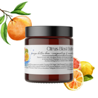 A 4oz jar of Heaven & Earth Aromatherapy's Body Butter – NEW Citrus Blast Summer Skincare, featuring citrus fruit art and a brown container with black lid, is perfect for hydrating your skin this summer.