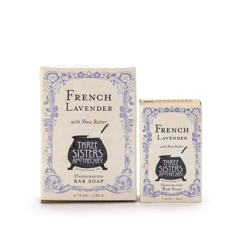 Two boxes of Soap Cauldron's Bar Soap French Lavender: 4.75oz, featuring decorative lavender designs and highlighting a moisturizing botanical complex with shea butter and lavender essential oil ingredients.