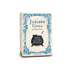 The "Bar Soap Juniper & Cedar" from Soap Cauldron is infused with essential oils, features a decorative blue border, and includes a cauldron graphic on the box.