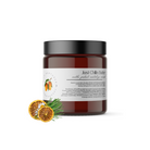 A jar of Wild Nurturer Aromatherapy's "Just Chillin 4oz Whipped Body & Feet Skin Repair Butter," with a clear label, featuring an image of a chili and citrus slices, enhanced with wild nurturer aromatherapy essential oil, isolated on a white background.