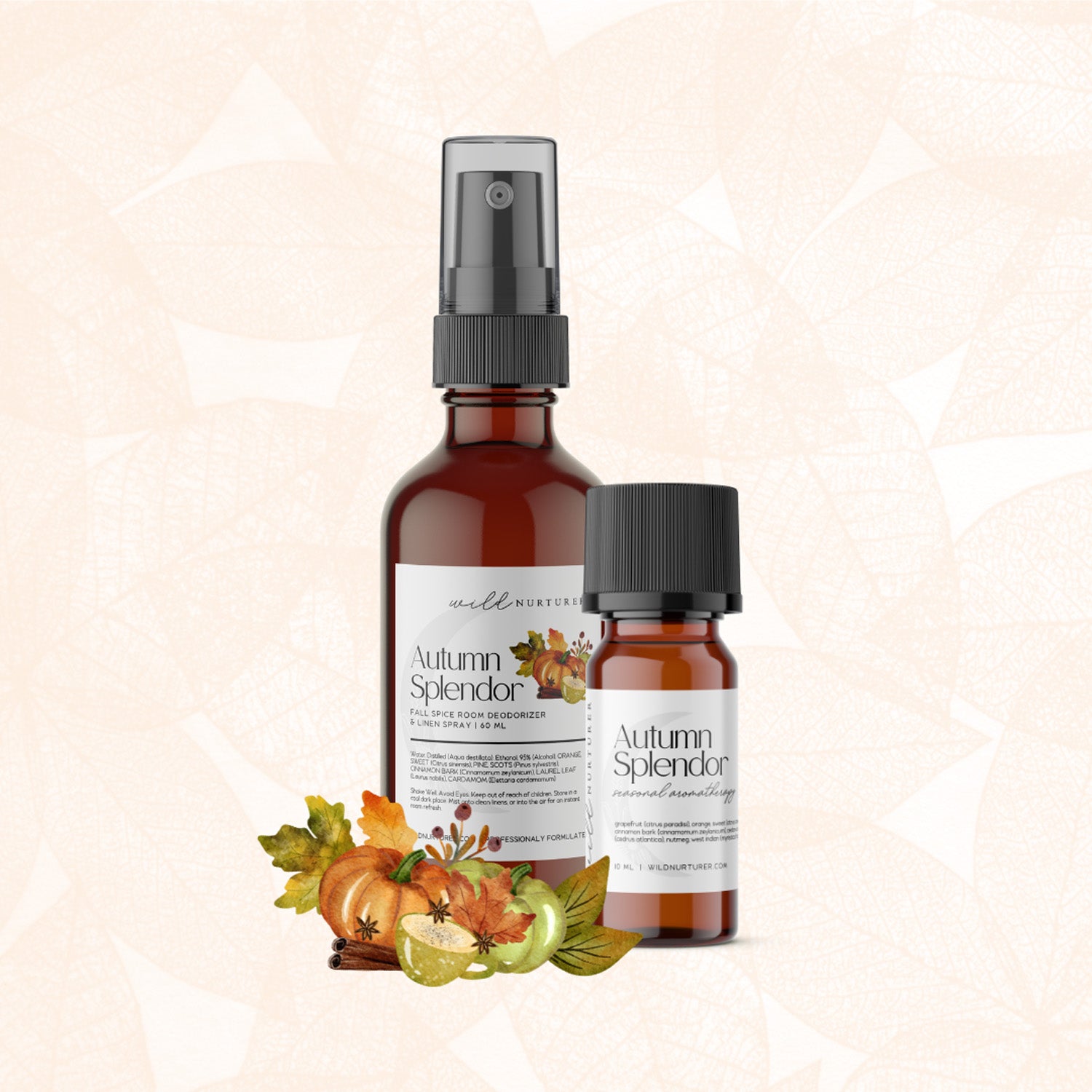 Two Autumn Splendor Wild Nurturer Aromatherapy products, a spray bottle and a smaller essential oil bottle, with a decorative autumn leaf and pumpkin design below them.