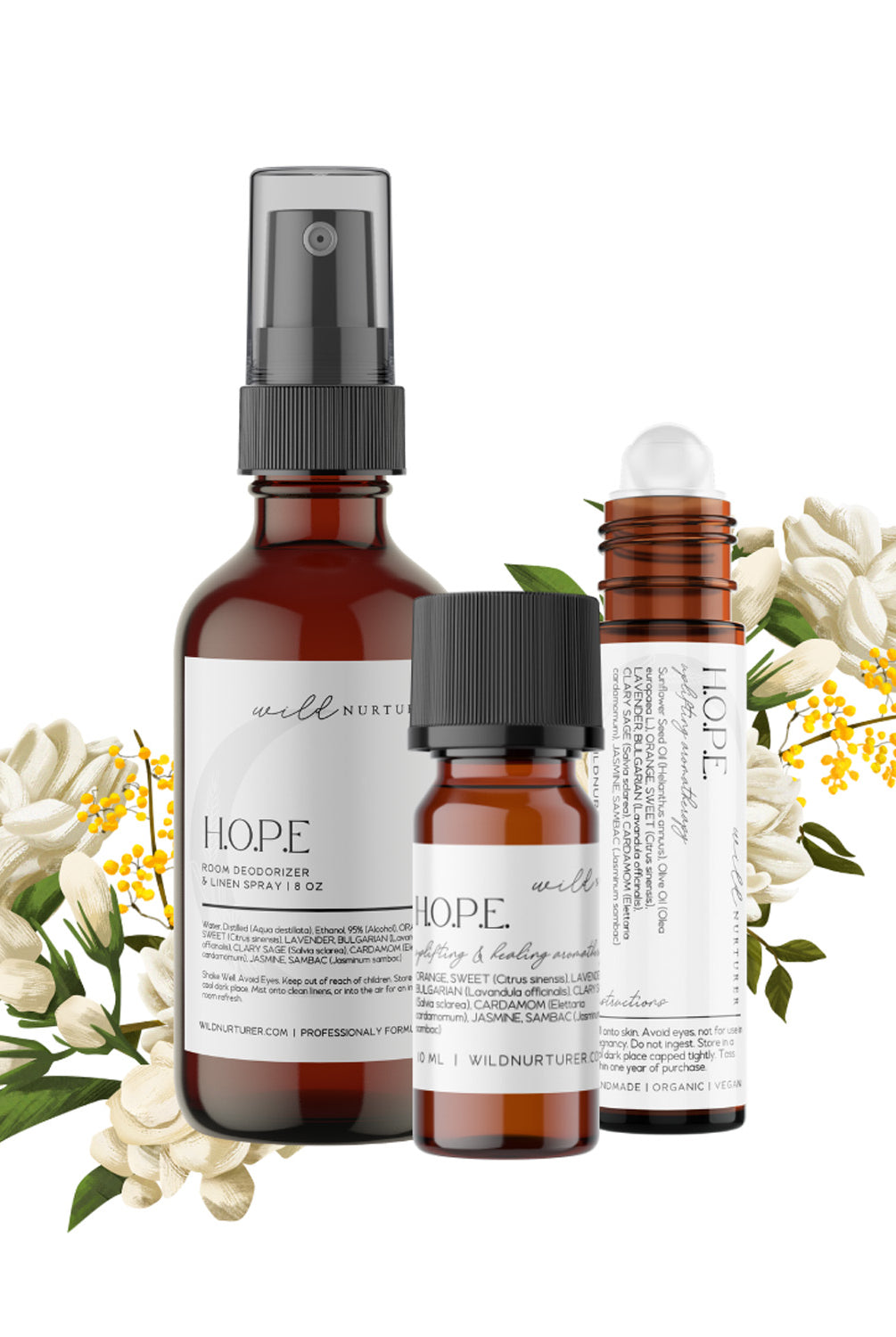 Three bottles of H.O.P.E Aromatic Blend essential oils arranged with white flowers on a white background for Wild Nurturer Aromatherapy.